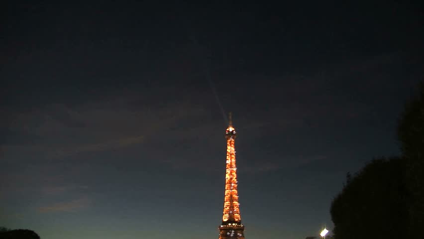 PARIS, FRANCE - CIRCA 2012: Eiffel tower at night tilt to blur
