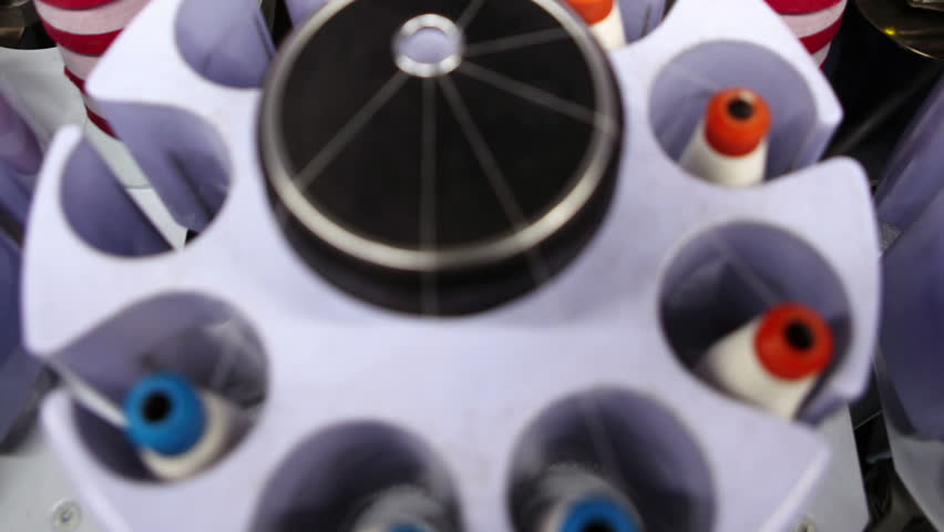 Video collage of all steps involved in turning raw cotton into fabric, from cotton sorting, to spinning, weaving and quality control check in a textile mill. Timelapse.