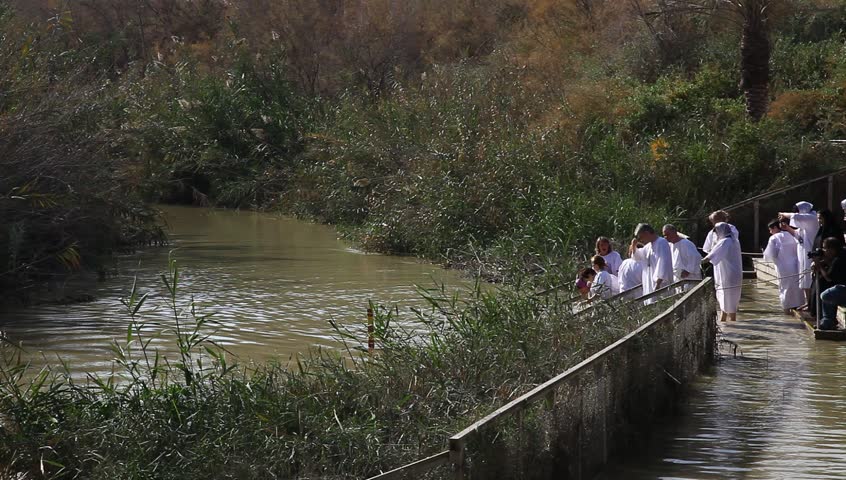 QASR AL YAHUD, ISRAEL â JANUARY 18: Greek Orthodox pilgrims baptize during the Epiphany at Qasr Al Yahud, Israel, January 18 2012