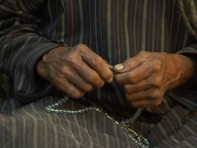Prayer beads (old man and woman buddhist)