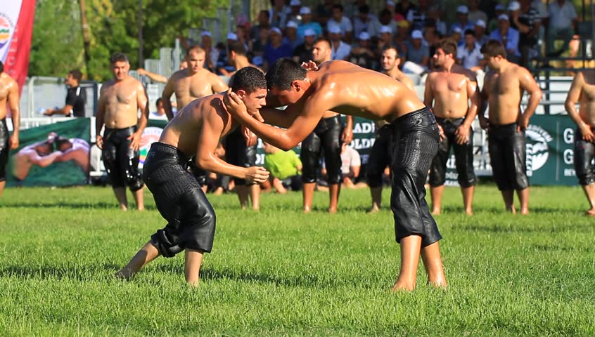 ISTANBUL - AUG 24: Unidentified wrestlers in the 8th Sile Annual Oil Wrestling Event on August 24, 2012 in Istanbul. Highest ranking wrestlers entering the arena
