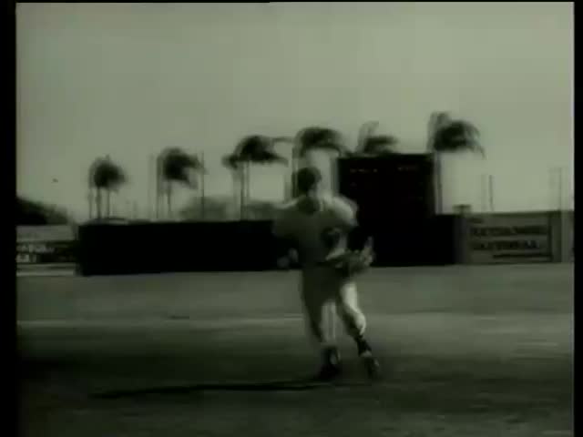 White Sox baseball players practice pitching in Florida circa 1958-MGM PICTURES, UNIVERSAL-INTERNATIONAL NEWSREEL, USA, filmed in 1958