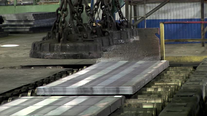 Hauling of steel sheets packages using Industrial lifting electromagnets.