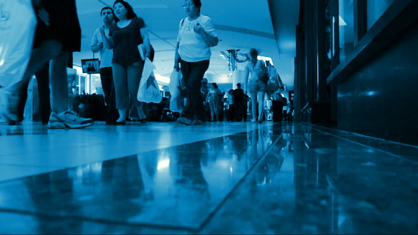 DADELAND MALL, MIAMI FL - DECEMBER 9: People shopping in Dadeland mall on December 9, 2008 in Miami Florida. Consumers are not optimistic about economy and cut back on holiday spending.