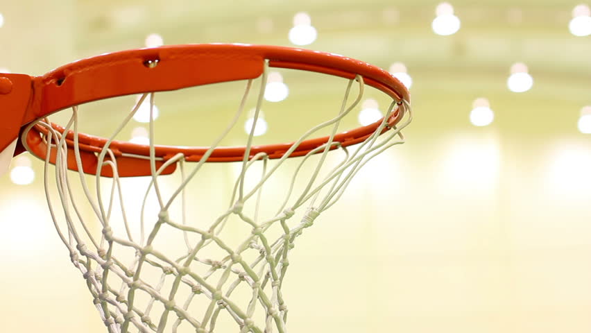 a basketball goes through the hoop