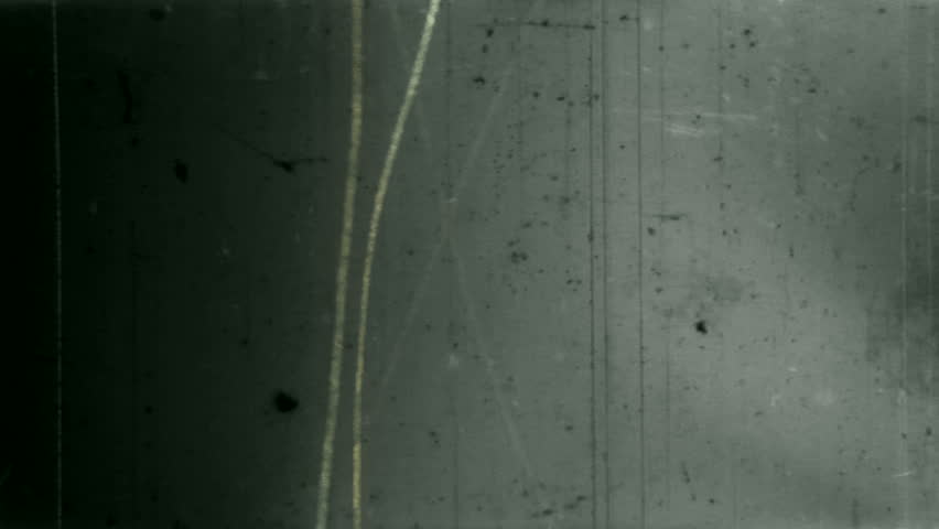 Animated damaged film texture with a grunge look. Loops perfectly. Part computer-generated, part manually scratched 16 mm film.
