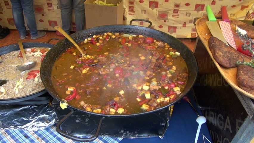 cooking meat and various vegetables stew in big pot