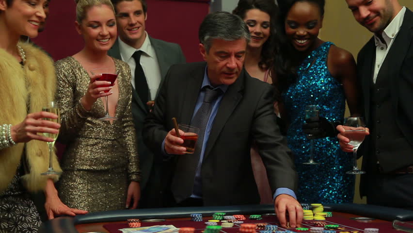Man winning at craps in casino