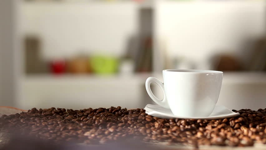 Coffee cup and coffee beans