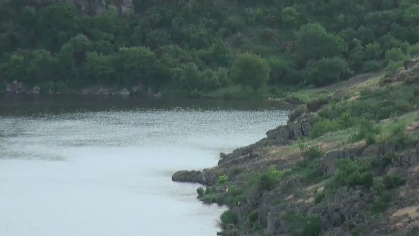 Water flowing over boulders