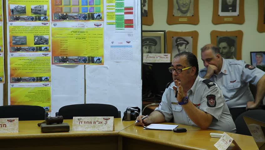 TEL AVIV, ISRAEL - OCTOBER 21: Firefighters get instructions and safety briefing in headquarters before earthquake simulation drill in Tel Aviv, Israel, October 21, 2012