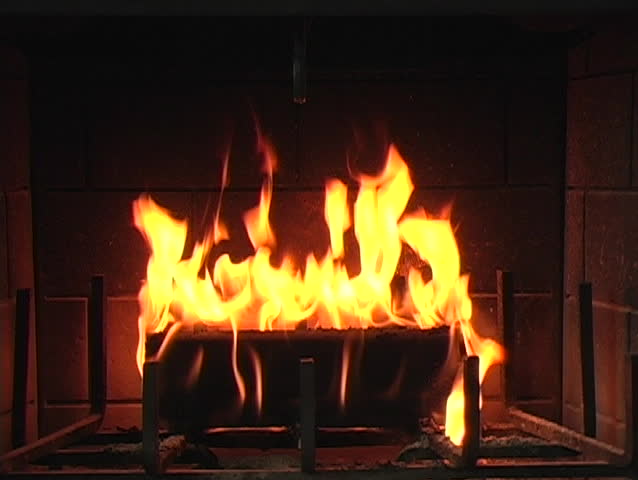 Flame in a fireplace with a dark background