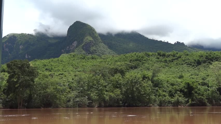 NAM OU RIVER - AUGUST 16: River cruise from Nong Khiaw to Luang Prabang August 16, 2012 in Nam Ou river, Laos.