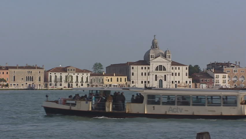 VENICE, ITALY - CIRCA MAY 2009: Venetian Lagoon boats crossing, vaporetto or water taxi circa May 2009 in Venice, Italy.