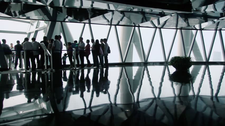 GUANGZHOU - NOV 22: Canton lookout tv tower with group of tourists on Nov 22, 2011, in Guangzhou, China. Canton Tower, formerly Guangzhou TV Astronomical and Sightseeing Tower, is observation tower.