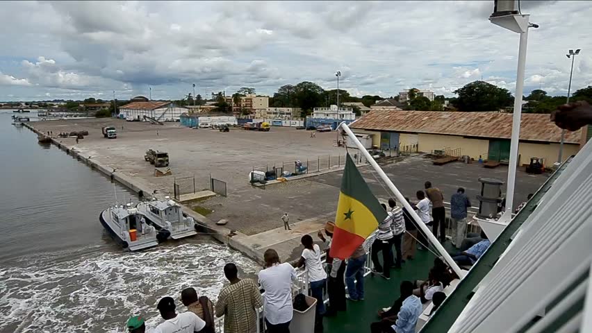 ZIGUINCHOR, SENEGAL - SEPTEMBER 29: Passengers aboard the new ferry between Ziguinchor and Dakar on September, 29 2012 in Ziguinchor, Senegal. The old ship sank in 2002, killing at least 1,863 people.