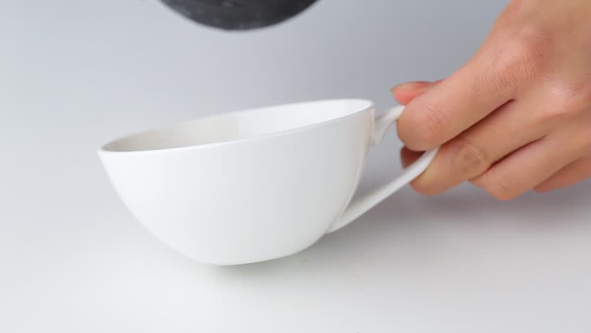 brewing cappuccino on a white background