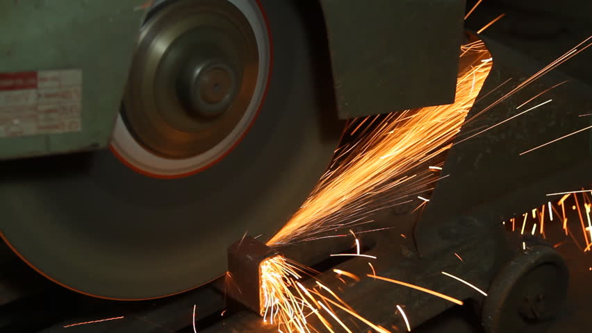 closed up metal saw cutting a steel