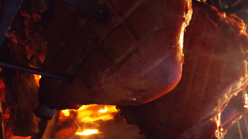 Christmas roast on a spit.