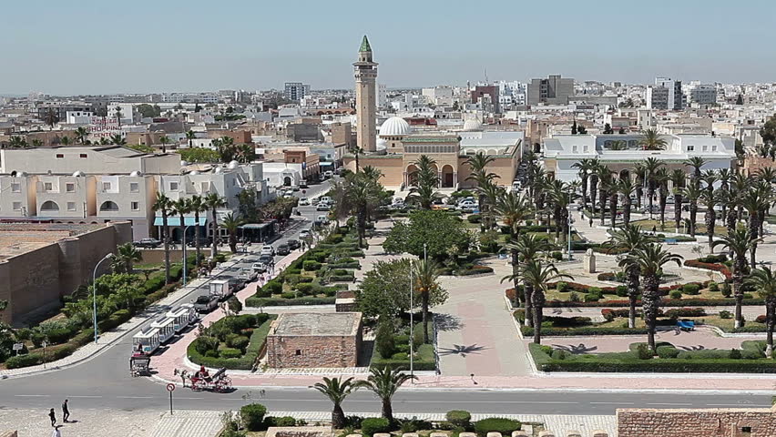 Aerial view of streets at Monastir city, Tunisia. Minaret of mosque and Ribat as a fortress.