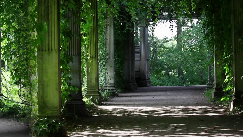 view over the green shady rotunda with columns