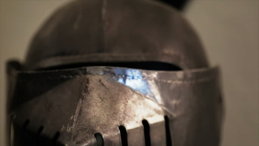 Detail of medieval armor, decorations and rivets on the breastplate and helmet, made of steel 