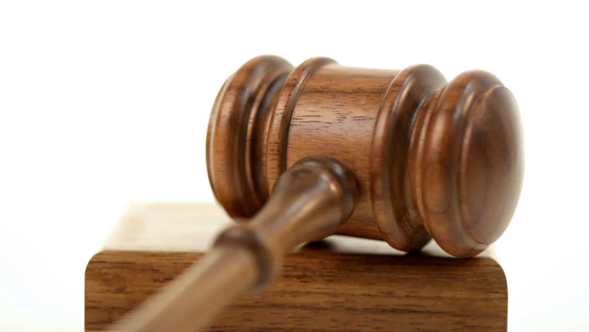A gavel pounded in a block. Version 1.