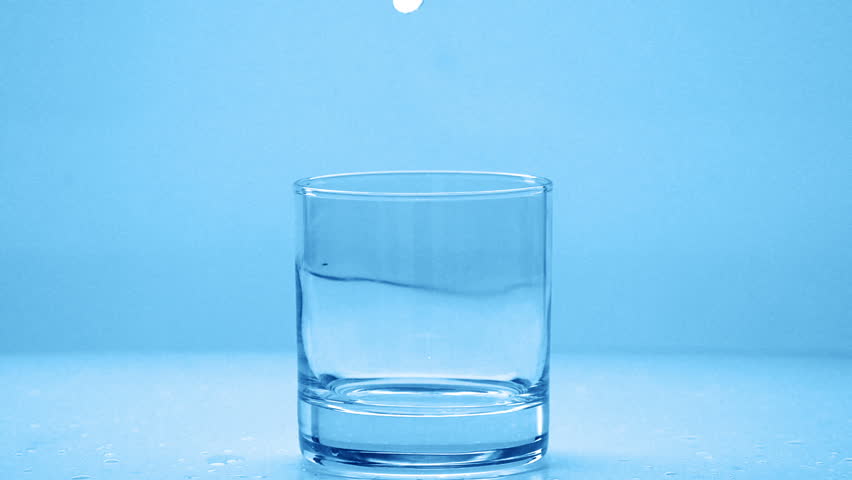 Pouring glass of water in slow motion fullHD real video