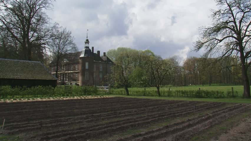 VORDEN, THE NETHERLANDS - APRIL 2012: Hackfort estate + pan surrounding landscape and historical kitchen-garden. Hackfort Caslte dates from the 14th century  (1376)