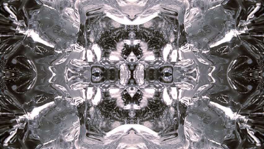 Rotating close-up, in kaleidoscopic quad pattern. Folding in. Based on strange ice blobs found on beach.