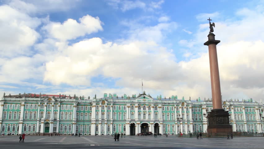 Timelapse. Winter Palace and Alexander Column on Palace Square in St. Petersburg at sunset.