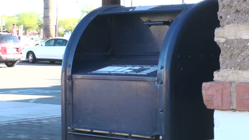 Placing mail in a post office box V2, HD 1080i