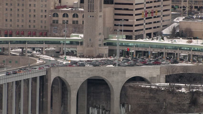 A time lapse shot of traffic passing from the Rainbow Bridge, through customs, and into Niagara Falls, Canada. 20 minutes compressed into 15 seconds.