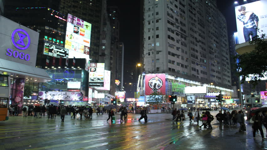 HONG KONG,CHINA - JULY 23: Shoppers and traffic in Hennessy Rd, Causeway Bay, Hong Kong, China, July 23, 2010. Timelapse View.