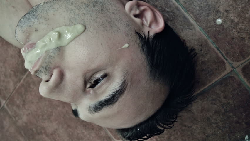Depressed young man drunk and drugged vomit  ing