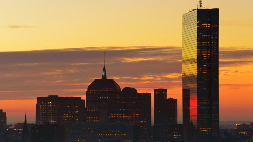 Timelapse of dramatic sunrise over Boston downtown time lapse as seen from Cambridge