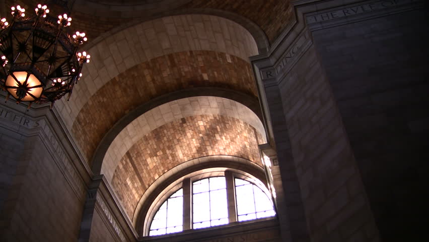 Pan shot of rotunda and chandelier in state capitol 