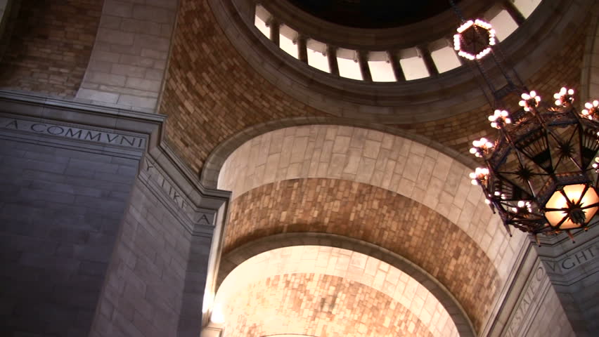 Pan shot of rotunda and chandelier in state capitol 