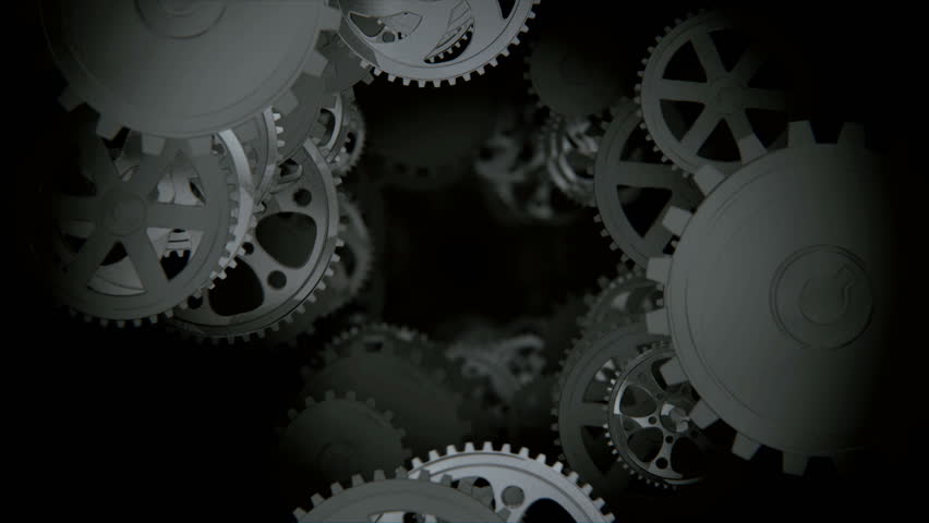 Camera moving through spinning gears and cogs