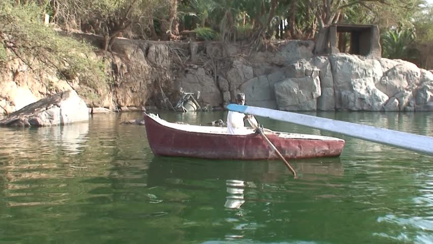 ASWAN, EGYPT - CIRCA 2007: Old FisherMan and the Nile