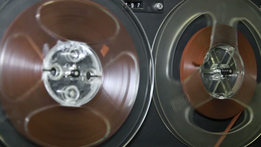 Old retro Reel Audio Recorder reels spinning