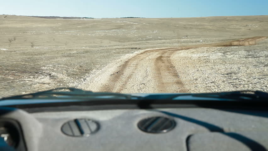 Off Road Driving Through Mountain Plateau