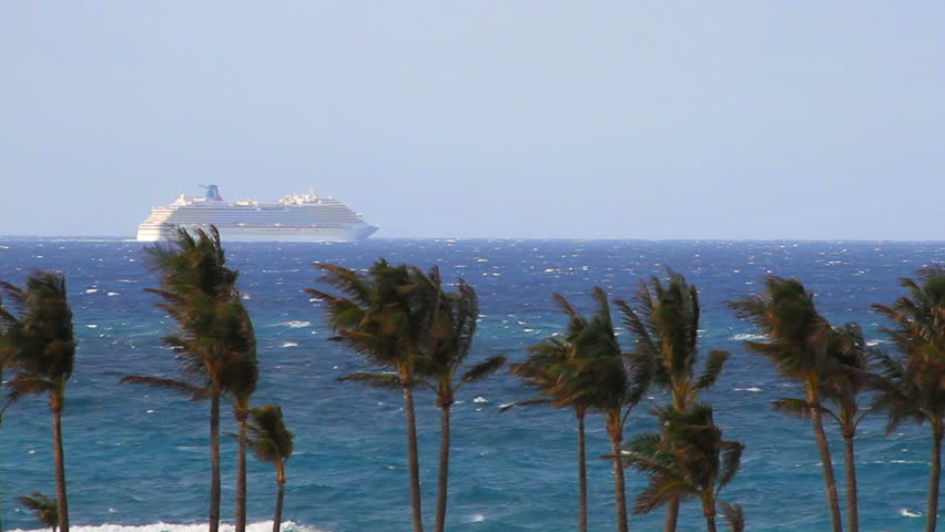 Cruise Ship Sails into Windy Blue Ocean with Palm Trees in Storm