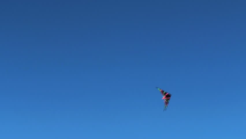 Stunt kite flying against blue sky V2 - HD 