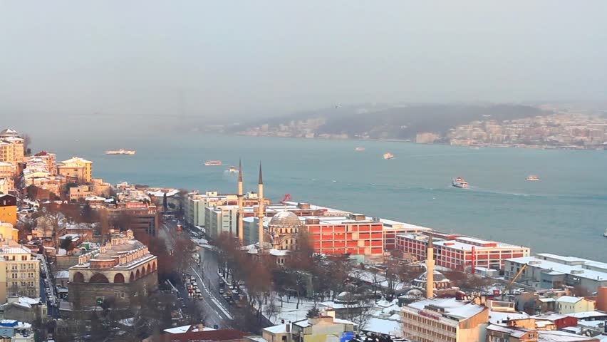 Tophane and part of Bosporus in Winter. Aerial view to Istanbul in the distance are such landmarks as Tophane i Amire building, Nusretiye Mosque and Istanbul Modern Museum. 