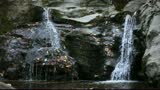 Waterfall in the river valley Syk
