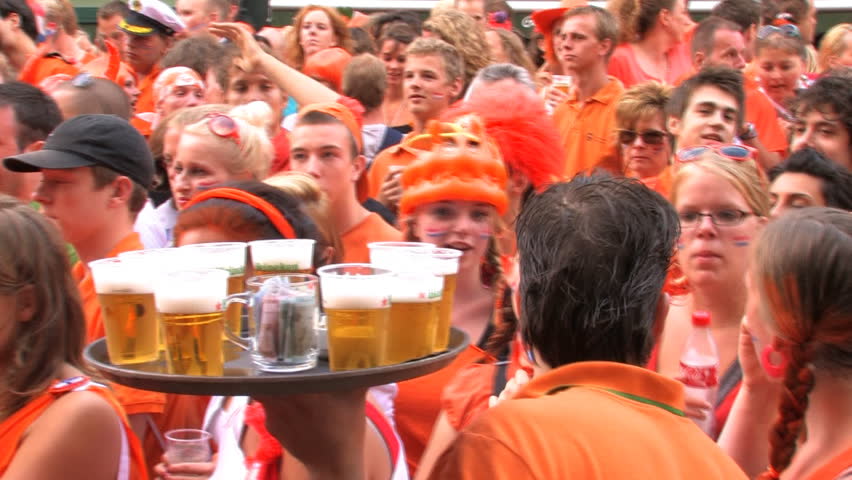 GRONINGEN, HOLLAND - JULY 11: Dutch soccer fans supporting their team during the final of the FIFA World Cup 2010 Netherlands vs. Spain - July 11, 2010 in Groningen, the Netherlands.