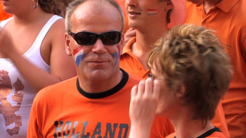 GRONINGEN, HOLLAND - JULY 11: Dutch soccer fans supporting their team during the final of the FIFA World Cup 2010 Netherlands vs. Spain - July 11, 2010 in Groningen, the Netherlands.