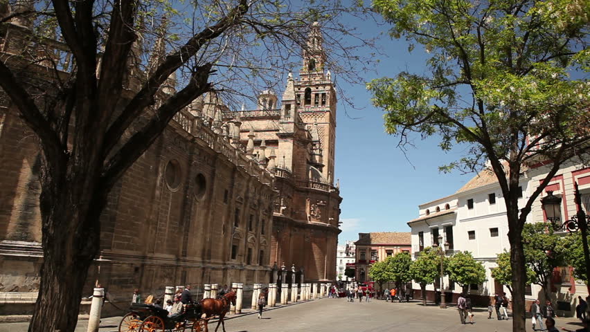 View of the famous Seville mosche with its Giralda minaret in a typical day