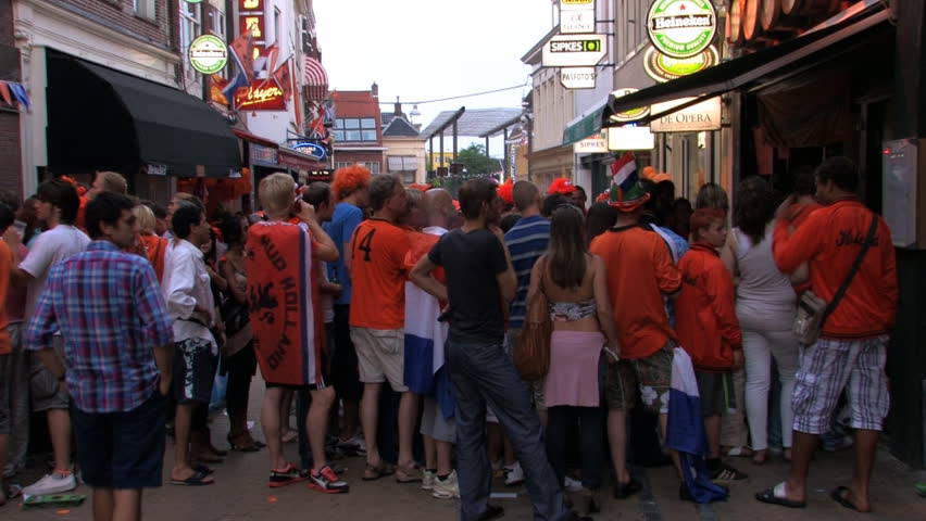 GRONINGEN, HOLLAND - JULY 11: Dutch soccer fans supporting their team during the final of the FIFA World Cup 2010 Netherlands vs. Spain - July 11, 2010 in Groningen, the Netherlands.